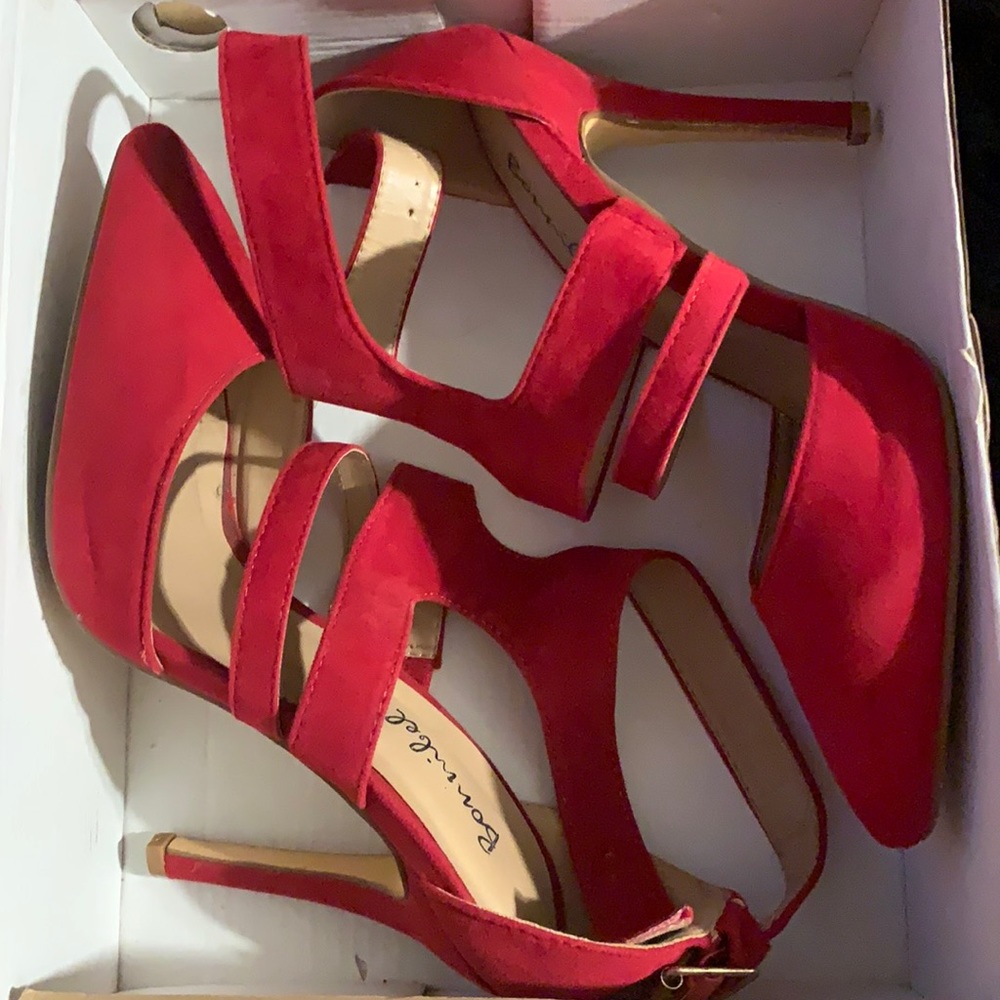 Red pointed toe heels